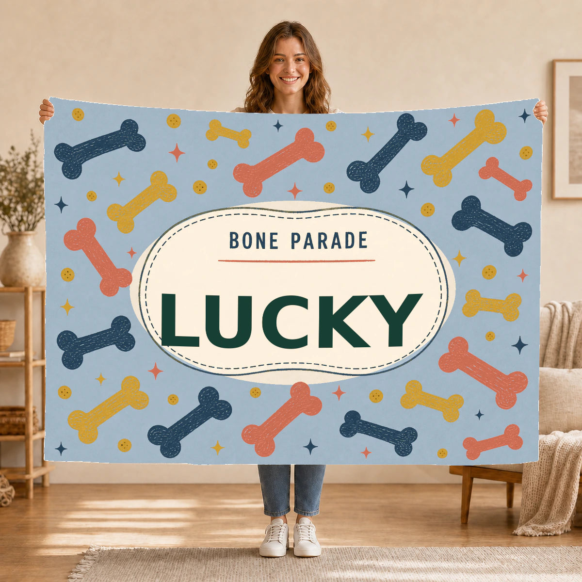 Personalised Dog Blanket – Bone Parade - Dusty Blue - Held up lifestyle