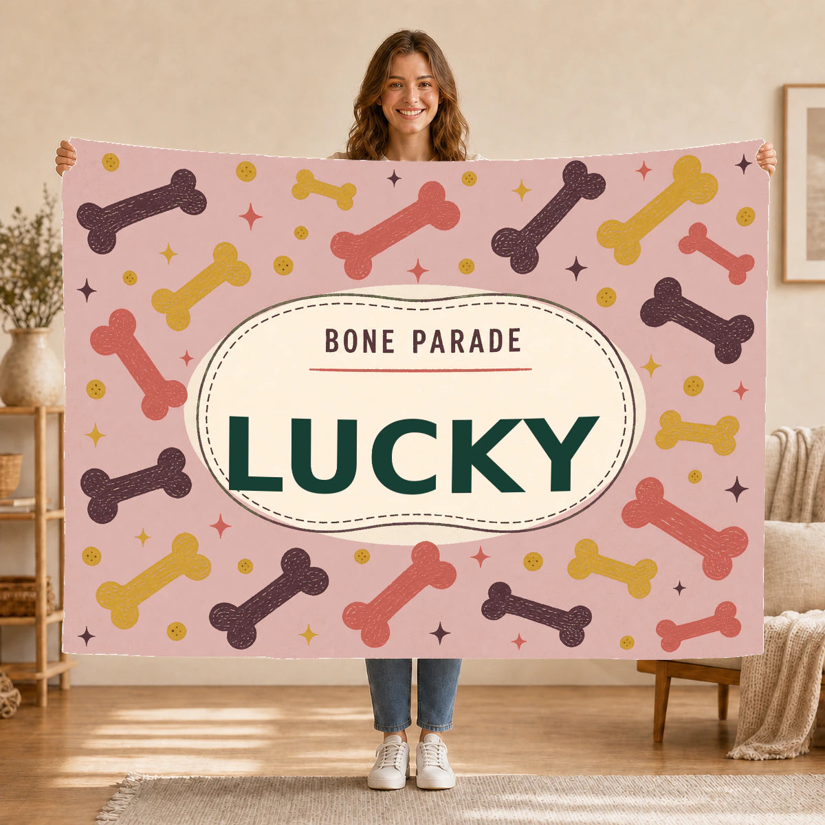 Personalised Dog Blanket – Bone Parade - Muted Blush - Held up lifestyle