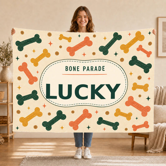 Personalised Dog Blanket – Bone Parade - Warm Oatmeal - Held up lifestyle