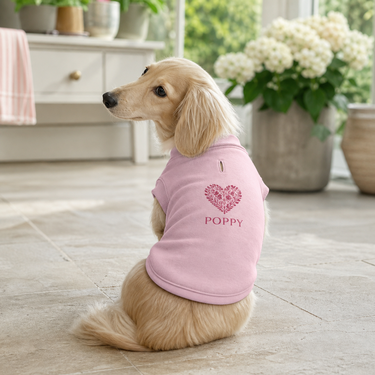 Pink personalised dog varsity jacket with a custom Poppy design